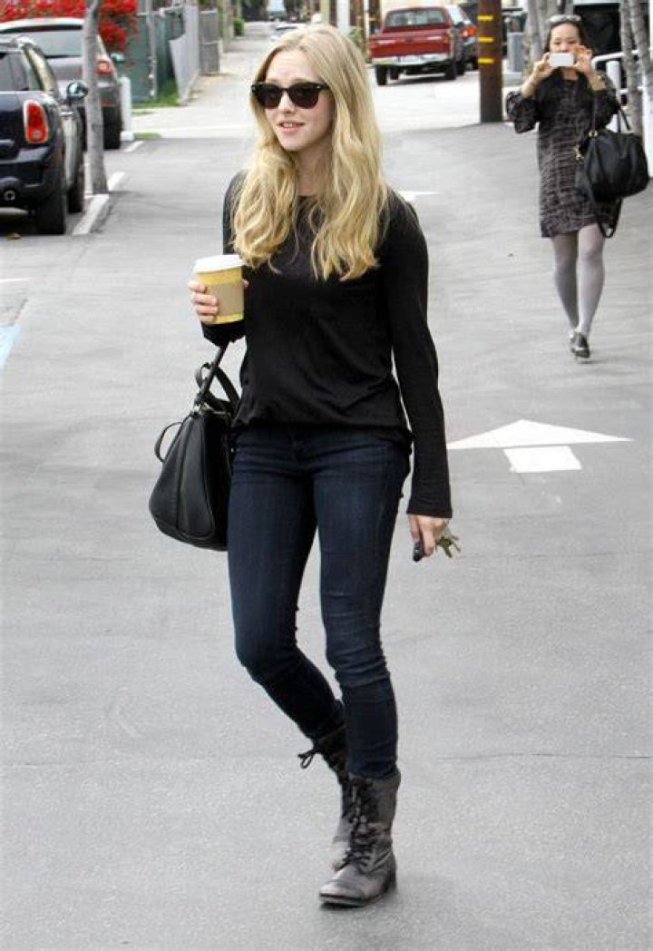 Chic:&nbsp;Seyfried cut a chic figure in a black velvet shift dress with long-sleeves and a mesh panel on the chest